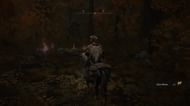 Amber Starlight rests under the statue (Image via FromSoftware Inc.)
